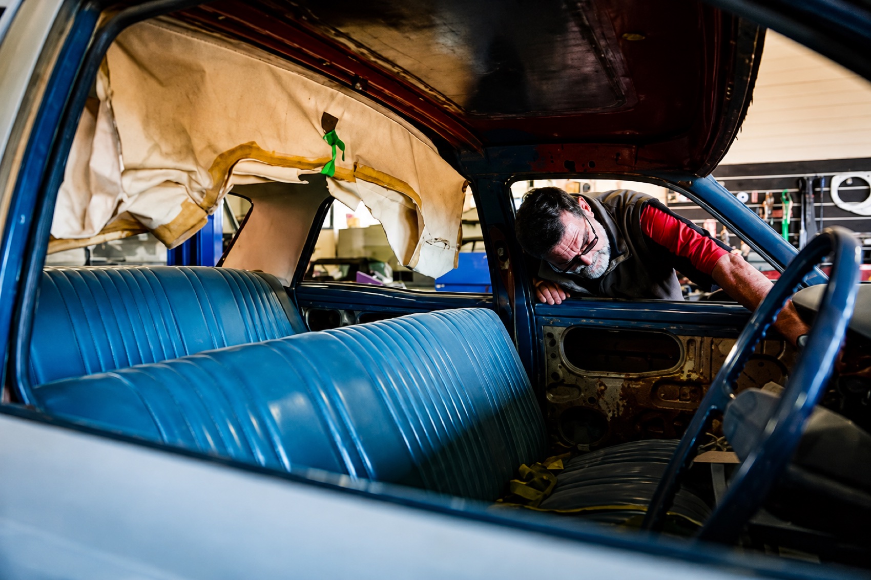 Restored blue leather interior of a classic car