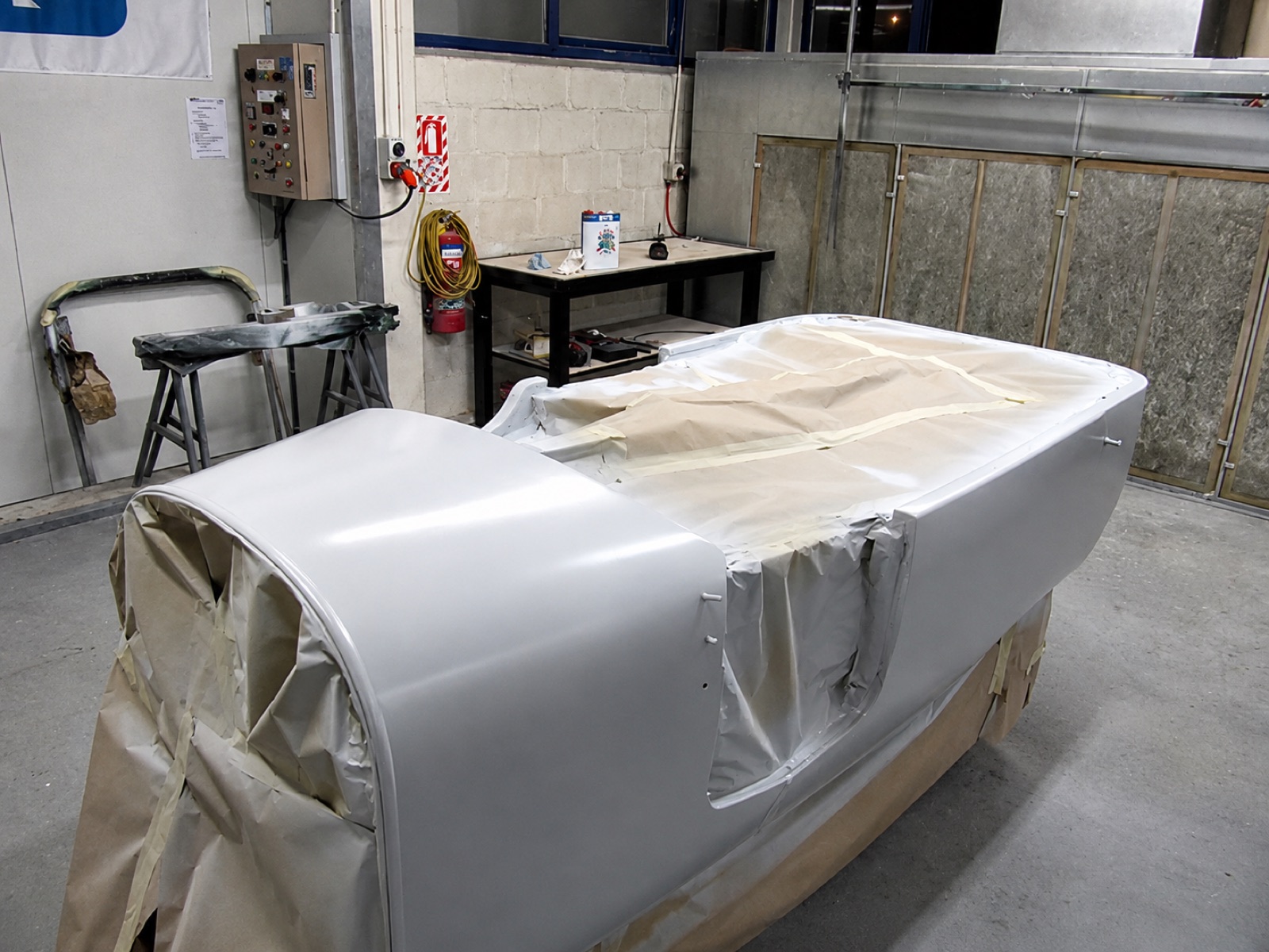 Model A pickup body in primer during restoration