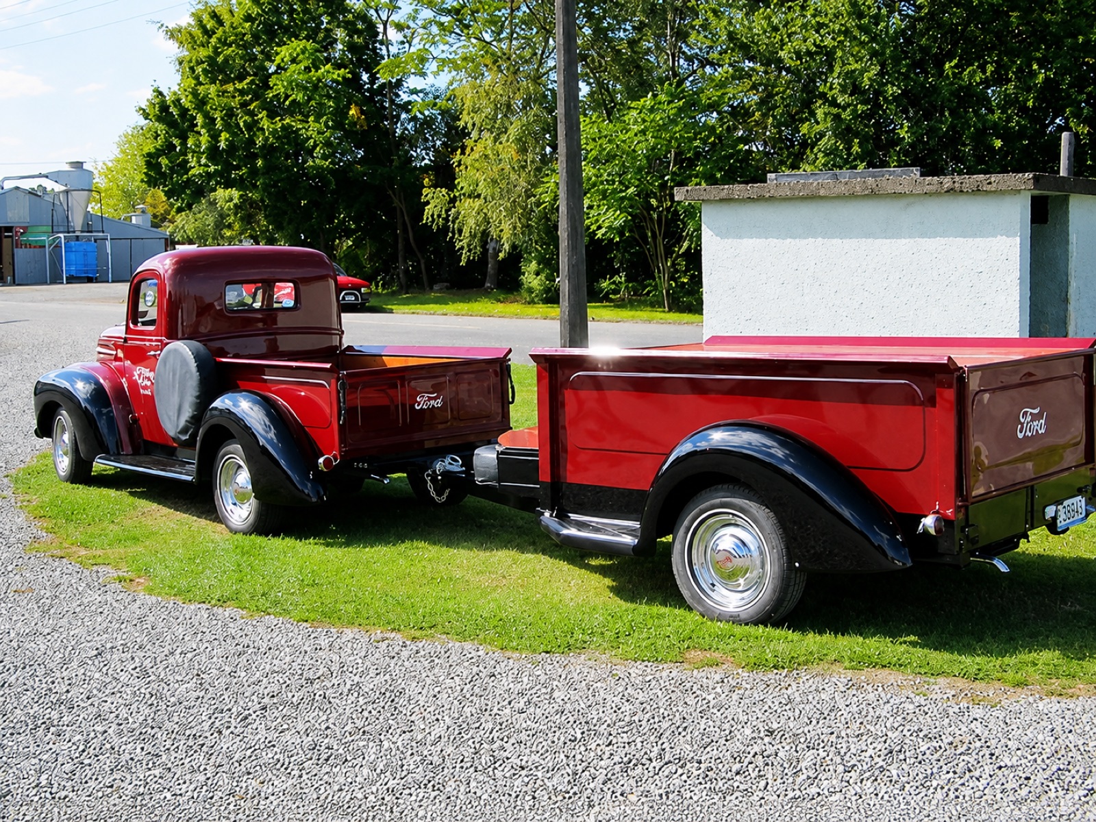 Restored 1940s Ford pickup with its matching trailer