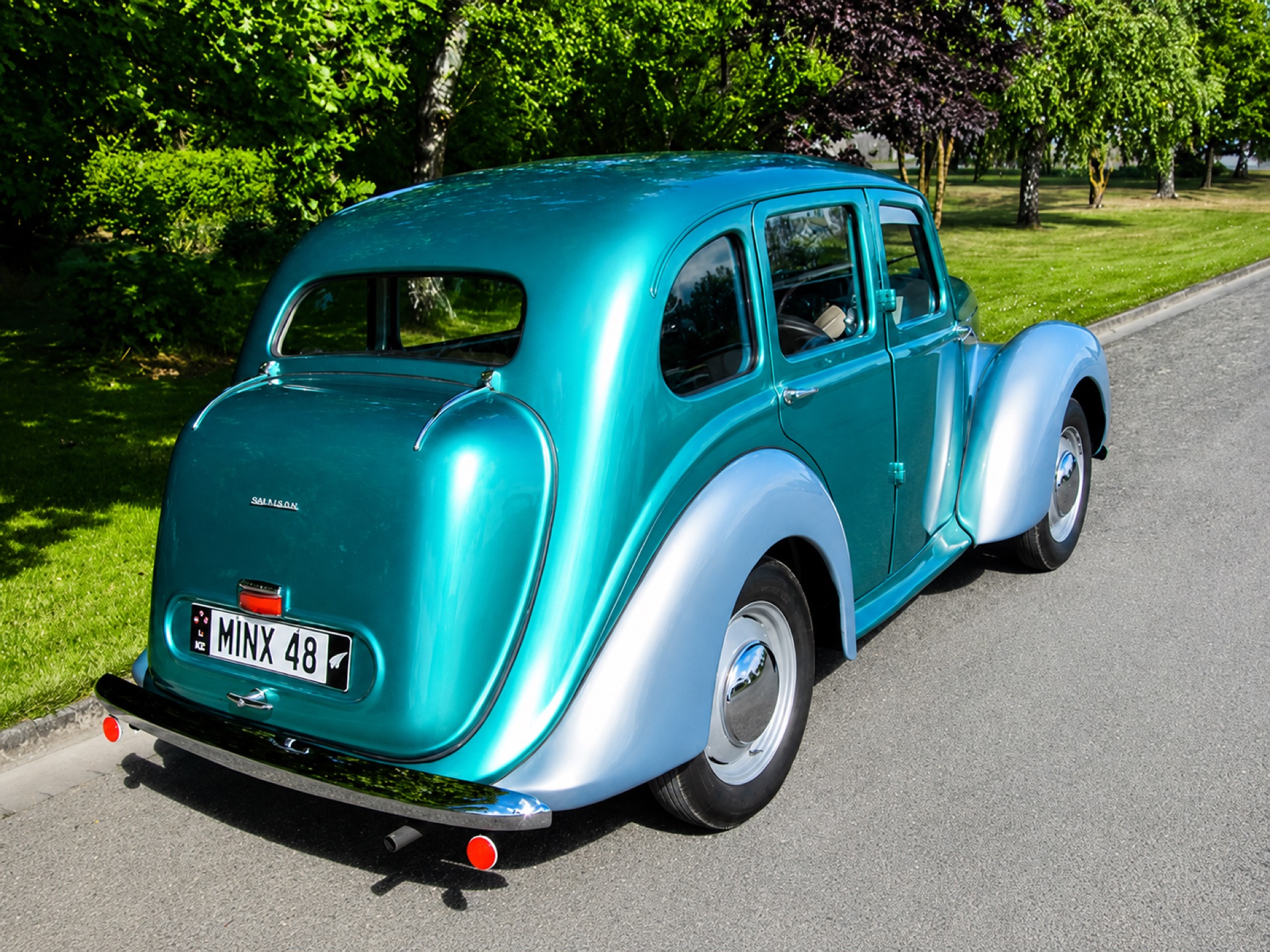 Fully restored teal classic Hillman saloon