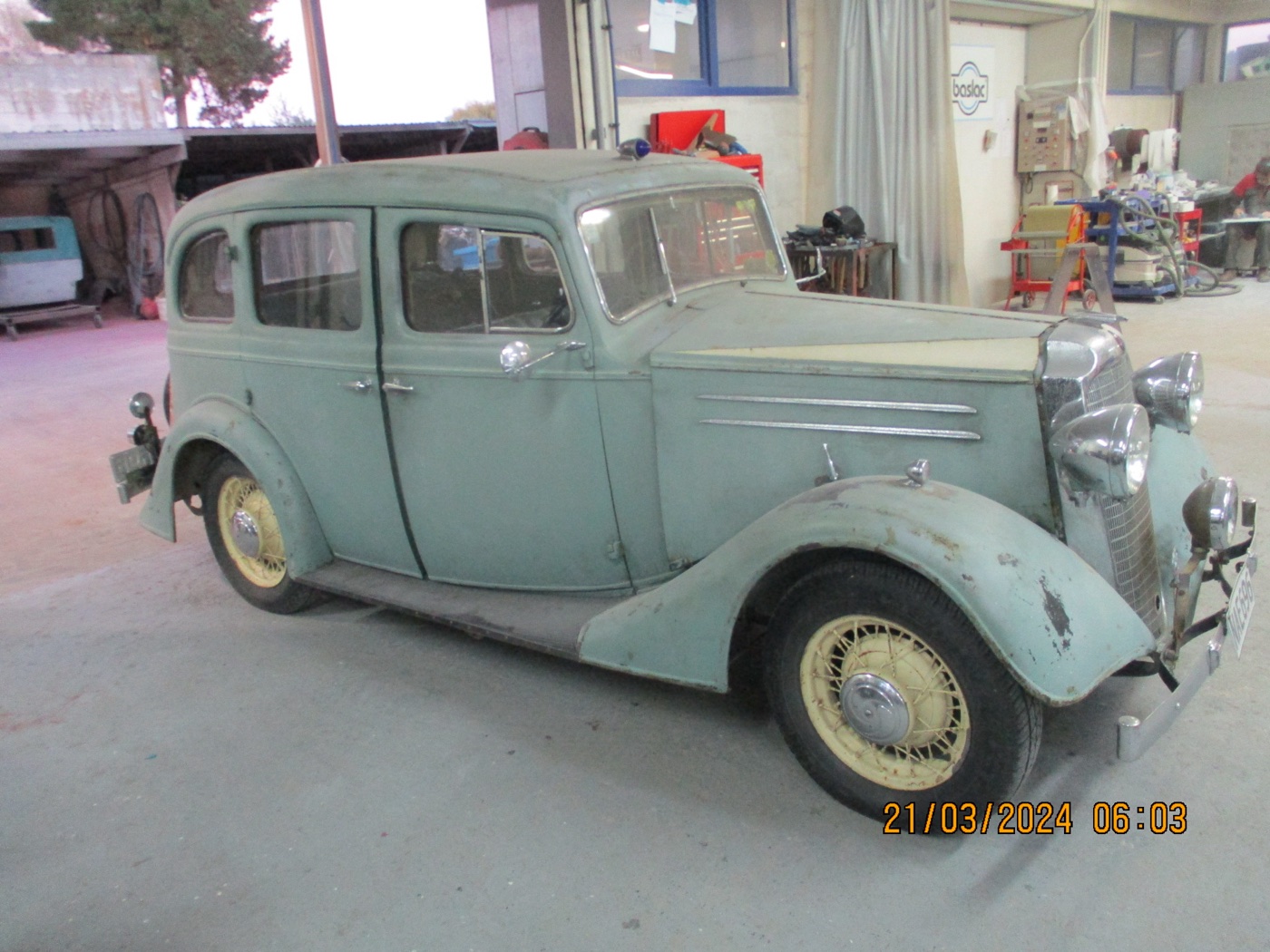 The Vauxhall DX before restoration, faded paint and surface rust